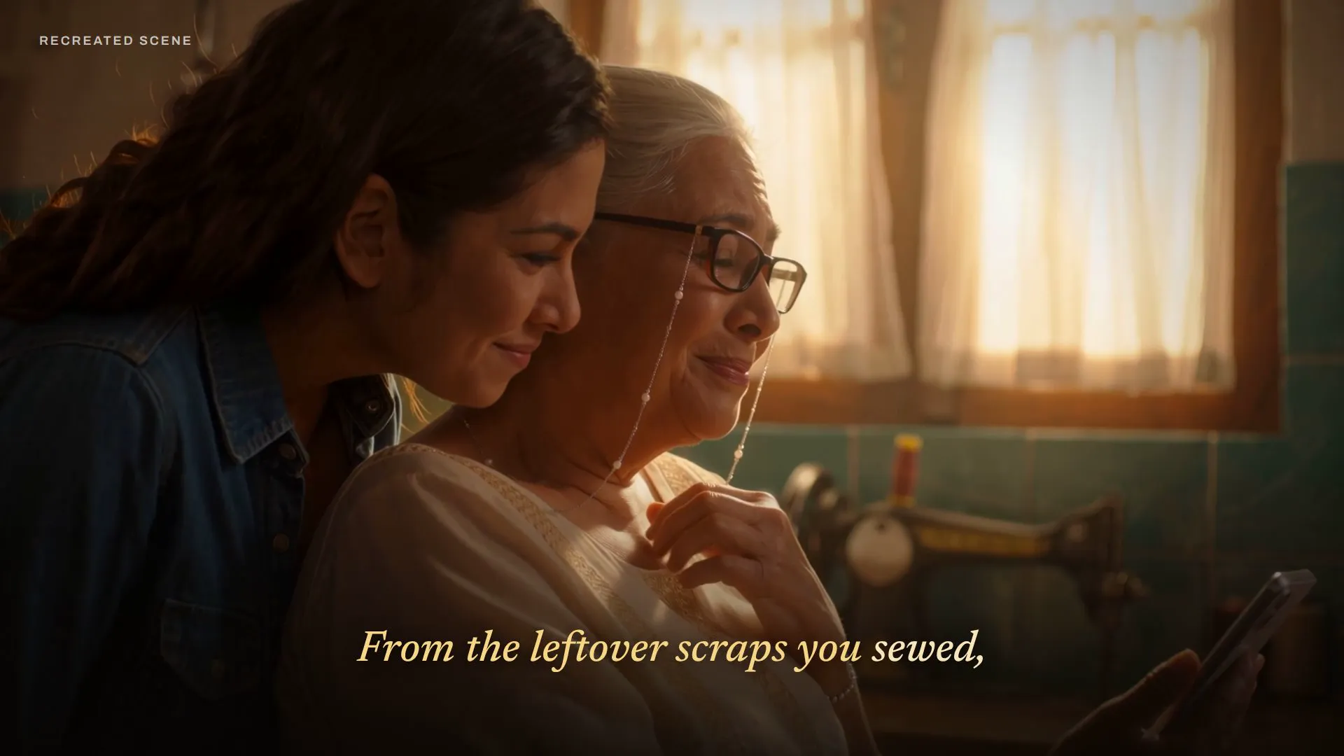 Recreated scene: a daughter hugs her mother as they listen to the song she made her